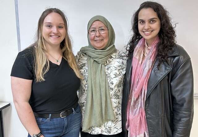 IRC NJ Adult Education student with IRC staff